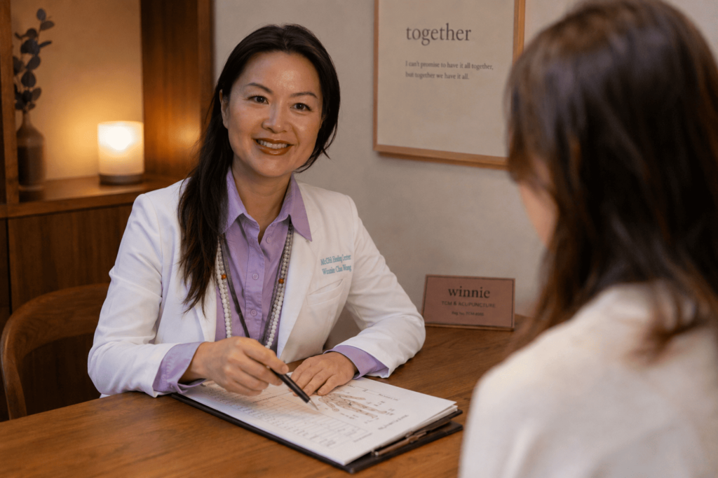 Acupuncturist treating a patient for hormonal weight management